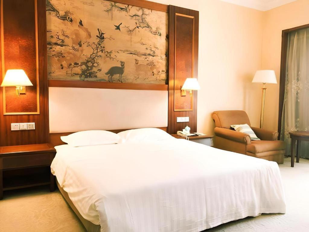 Fenggang Gladden Hotel Tiantangwei Exterior foto