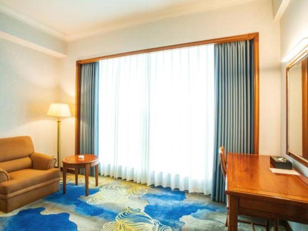 Fenggang Gladden Hotel Tiantangwei Exterior foto