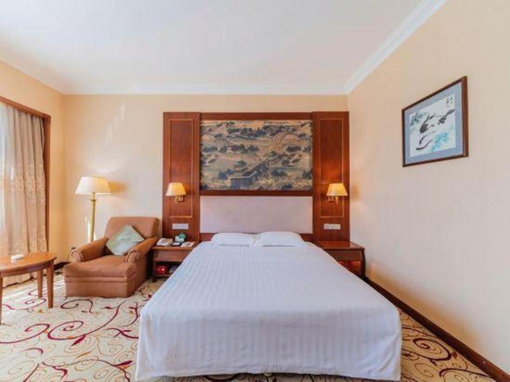 Fenggang Gladden Hotel Tiantangwei Exterior foto